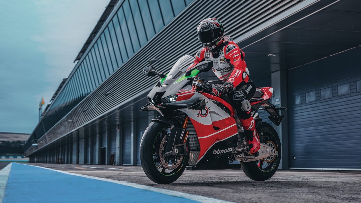 Red and white Bimota superbike in a race-track pit lane