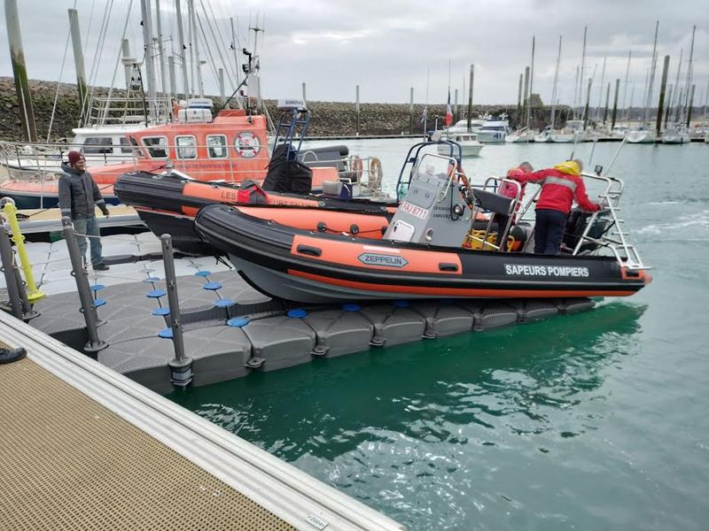 Rescue boat on a heavy-duty floating berth