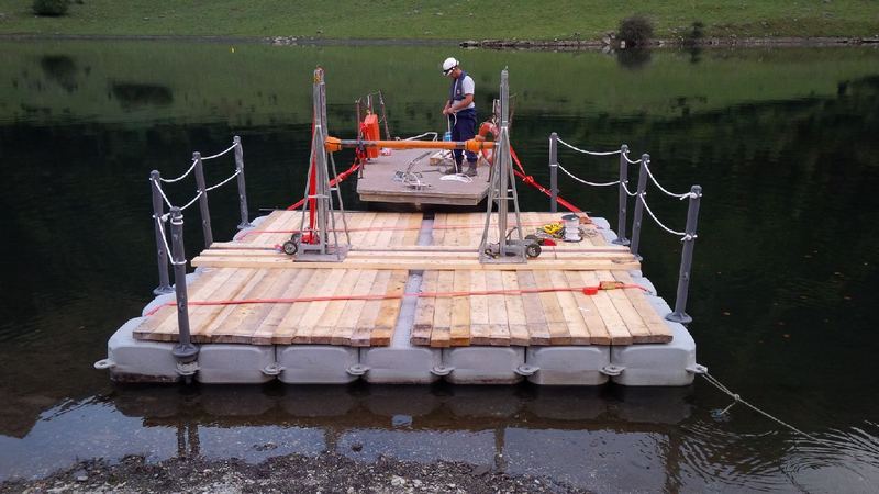 Wooden-deck floating platform with railings
