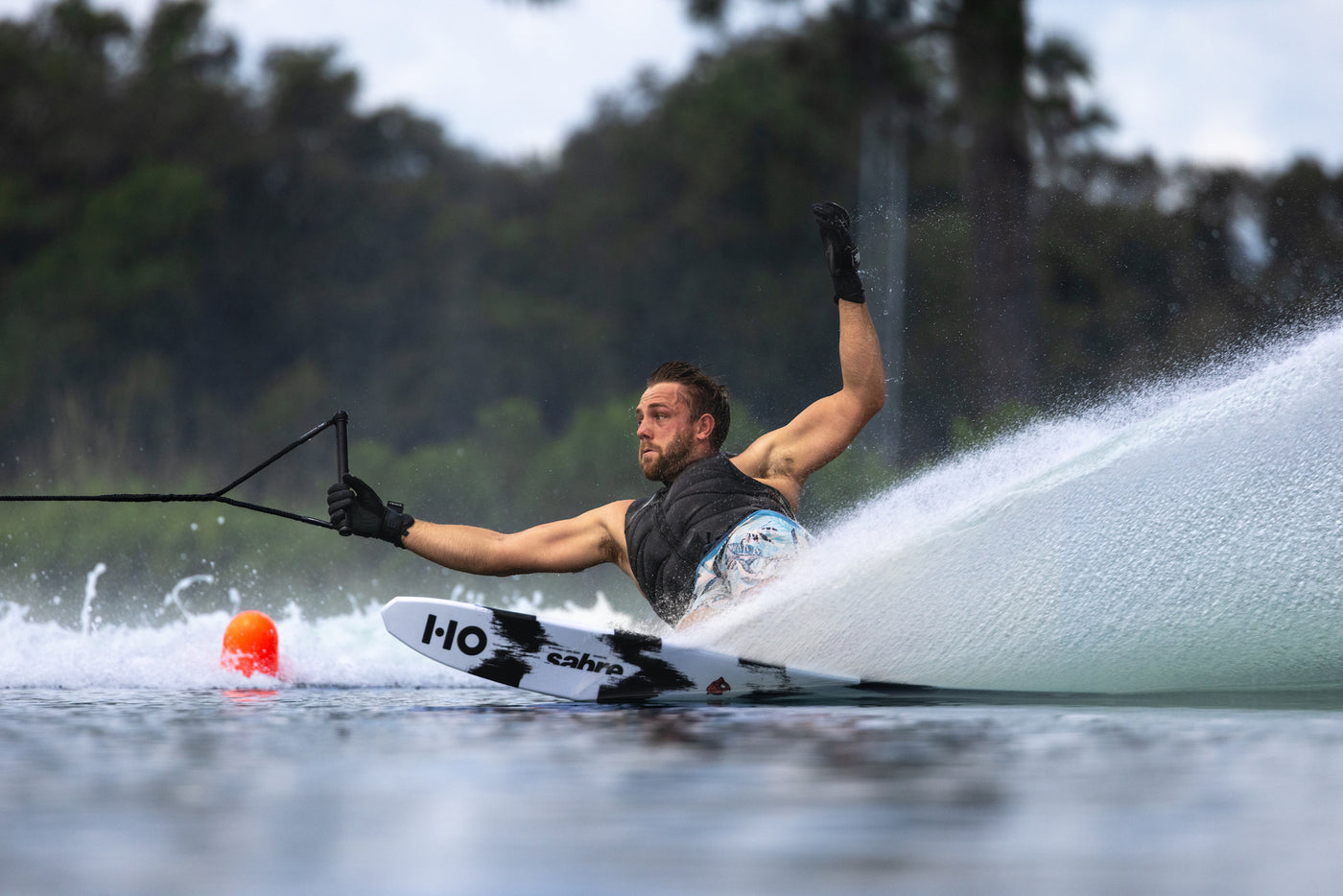 Waterskier carving a slalom turn
