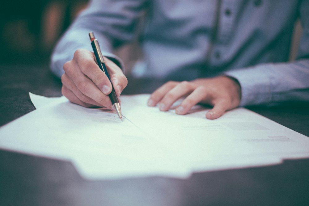 Hand signing official documents